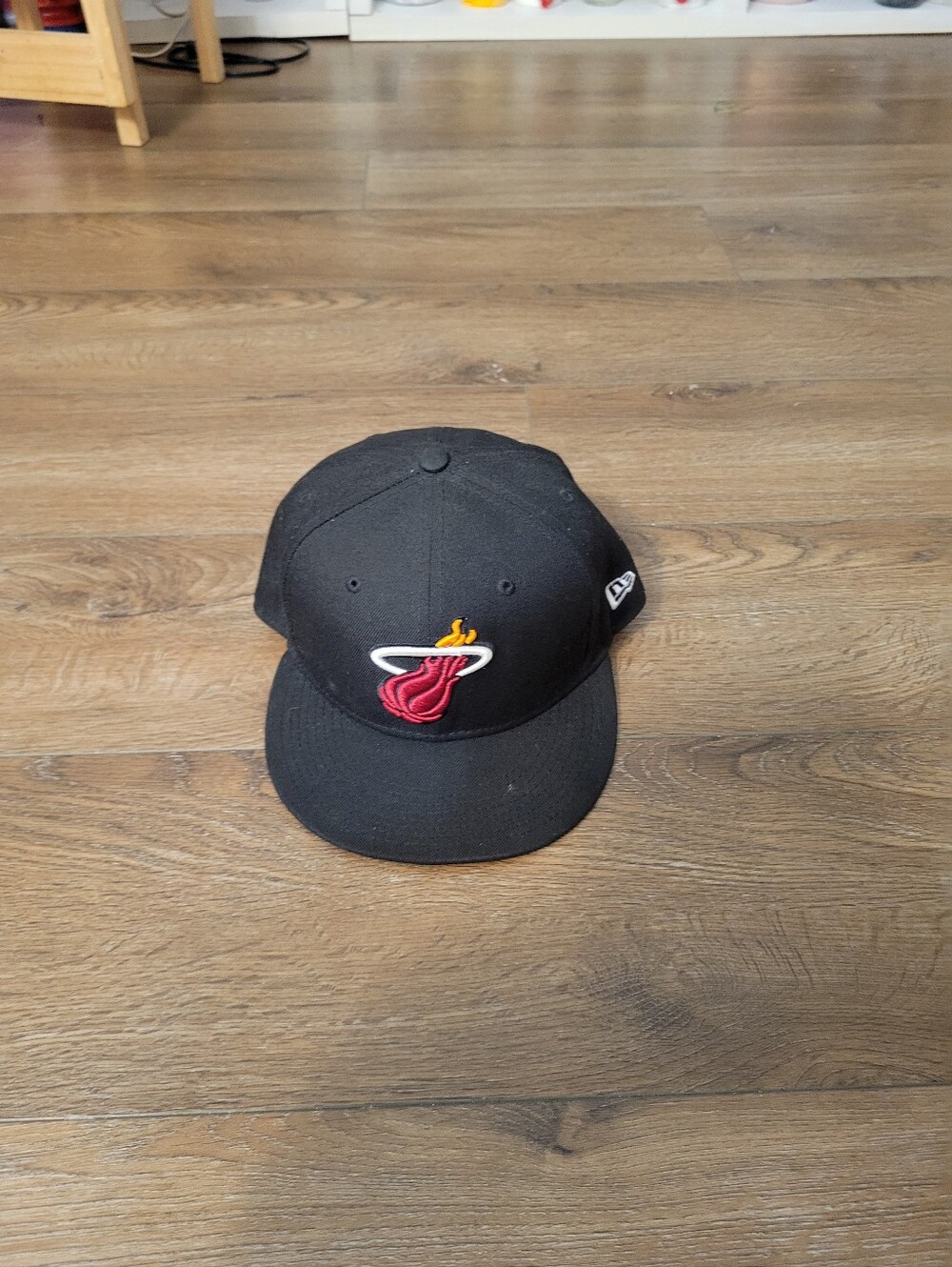 New Era Mens Black Miami Heat Logo Snapback Hat with Red and Yellow Embroidery